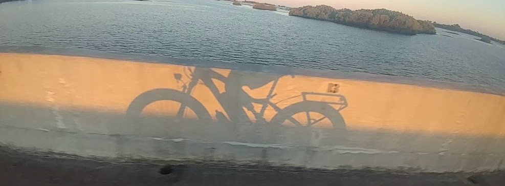 Roger Cleworth Life Coaching Bi Lateral amputee on bicycle